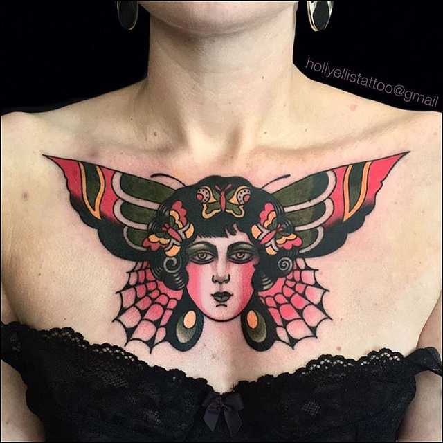 Бабочка и женская голова тату на груди